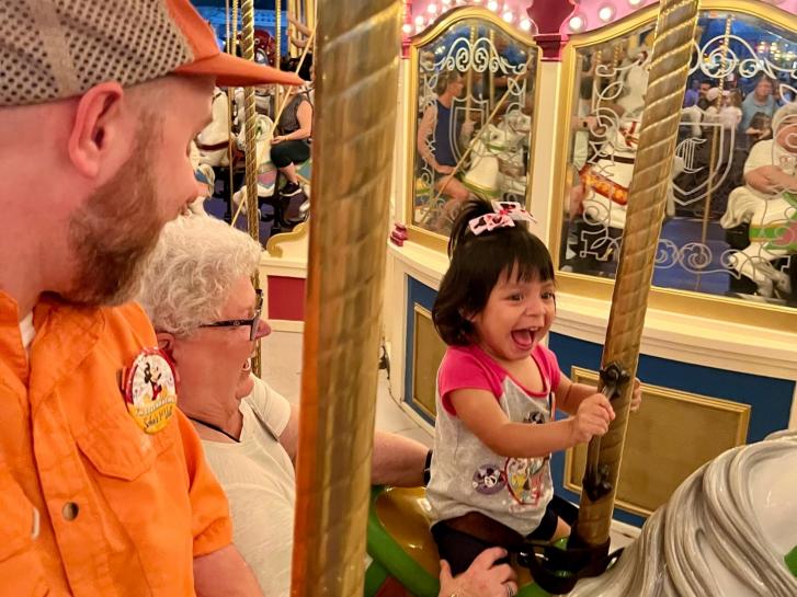 Guest Photo from Shelley Sanderson: Guests on the Prince Charming Regal Carrousel at Magic Kingdom